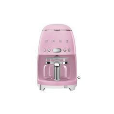 a pink toaster sitting on top of a white table