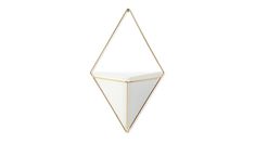 a white and gold geometric wall hanging with a triangular shape in the center, on a white background