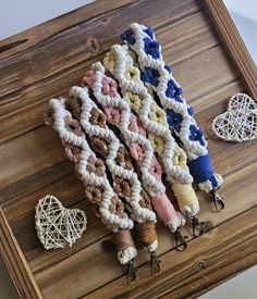 there are several pieces of crochet on the table