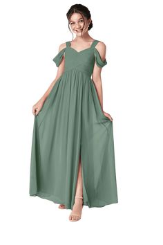 a woman in a long green dress