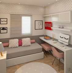 a room that has a couch, desk and chair in it with polka dots on the walls