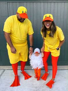 two adults and a child dressed up as ducky and the real life chicklings