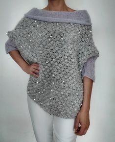 DESCRIPTION-Romantic sweater you can wear in 3 ways. Yarn with sequins  Color-Gray            MAINTENANCE - Dry cleaning or gentle hand washing in water with a mild detergent at a temperature of up to 30 degrees. Avoid twisting when washing. Rinse with cold water, gently squeeze with light pressure. Dry on a flat surface on a towel to pick up excess water Winter Sequin Sweater, Romantic Sweater, Sequin Sweater, Hand Knitted Sweaters, Gray Sweater, Knitted Sweater, Flat Surface, Jumpers And Cardigans, Serbia