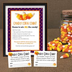 some candy corn in a glass jar next to a sign with instructions on how to use it