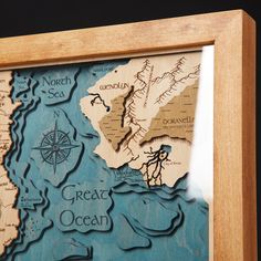 a wooden frame with a map cut out of it