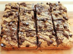 chocolate chip cookie bars cut into squares on a cutting board