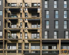 an apartment building with multiple balconies and windows