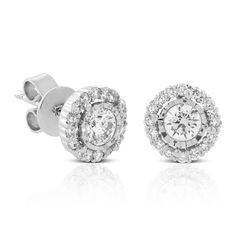 A center diamond is enhanced by a faceted setting and a surrounding halo of additional diamonds to give you stud style earrings that truly sparkle and shine. Halo Diamond Earrings, Halo Stud Earrings, Halo Earrings, Stud Style, Halo Earrings Studs, Bezel Set Diamond, Sparkle And Shine, Diamond Halo, Style Earrings