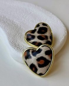 ✨ Unleash Your Wild Side! ✨ These gold-plated heart-shaped leopard earrings are the perfect blend of boldness and elegance. Designed for modern women, they feature a unique leopard pattern that adds a touch of sophistication to any outfit. 💖 Why You'll Adore These Earrings: Stylish Design: The leopard pattern within the heart shape creates a chic and eye-catching look. Premium Quality: Made from gold-plated materials, ensuring durability and a radiant shine. Lightweight Comfort: Perfect for all-day wear without compromising on style. Versatile Appeal: Complements casual and formal outfits alike. 🎁 A Wonderful Gift for: Anniversaries, birthdays, or just because! Women who love statement jewelry with a unique twist. 📏 Product Details: Material: Gold-plated metal. Design: Heart shape with Leopard Earrings, Heart Leopard, Casual And Formal Outfits, Bold Jewelry, Earrings Elegant, The Leopard, Wedding Jewelry Earrings, Formal Outfits, Modern Women