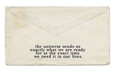 an envelope with the words, the universe sends us exactly what we are ready for at the exact time we need it in our lives