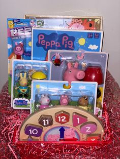 peppa pig toys are sitting on a table