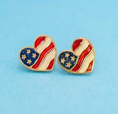 Vintage Patriot Hearts Stud Earrings by Avon N26 GENERAL DESCRIPTION American-themed heart stud earrings. Color: Gold Tone/Red/Blue/White Brand: Avon Size: Last photo includes measurements  If you have any questions please feel free to message me! Patriotic Earrings, Vintage Avon, Heart Studs, Heart Earrings Studs, Usa Flag, Jewelry Earrings Studs, Red And Blue, Heart Shapes, Jewelry Box