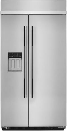 the side by side refrigerator is stainless steel and has an ice dispenser