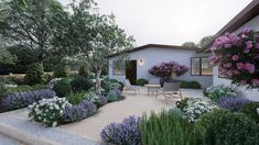 a house with flowers and shrubs around it