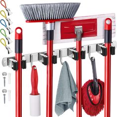 a red and white rack with cleaning supplies hanging from it's sides next to other tools