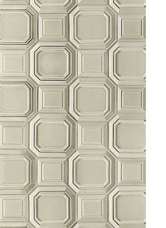 an abstract white tile pattern with hexagonal shapes