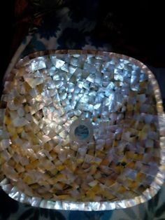 the bowl is made out of mother of pearl