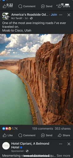 an image of a road going through the mountains with water and clouds in the background