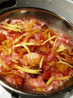 the food is prepared and ready to be cooked in the pot on the stove top