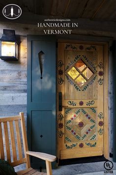 a wooden chair sitting in front of a blue door