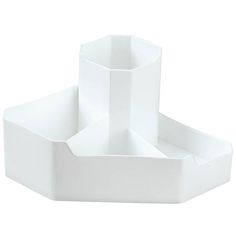 three white cups are stacked on top of each other in the shape of rectangles