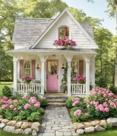 a small white house with pink doors and flowers