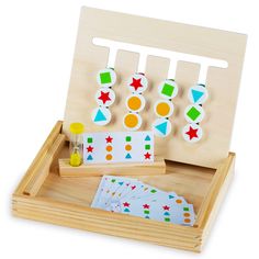 a wooden toy set with matching shapes and colors