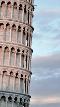 the leaning tower is very tall and has arches