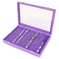 an open purple box with lots of rings in it