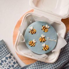 there is a cake with bees on it