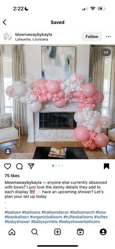 a living room filled with furniture and balloons on top of a fireplace mantel in front of a window