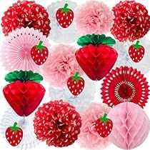 a bunch of strawberries and other decorations