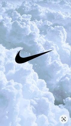 the black nike logo is in the clouds