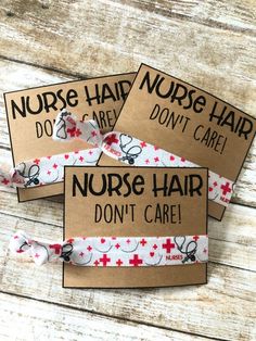 three nurses hair ties with red crosses on them, one for nurse and the other for don't care