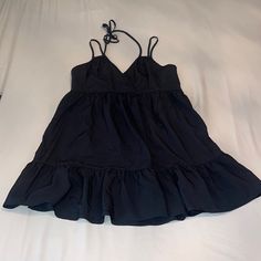 Never Worn Black Ruffled Sundress For Spring, Black V-neck Mini Dress For Summer, Black Mini Sundress With Ruffles, Black Sundress With Ruffles, Black Ruffled Mini Sundress, Black Sleeveless Sundress For Date Night, Black Ruffled Sundress, Casual Black Spaghetti Strap Dress, Black Cotton Dress For A Day Out