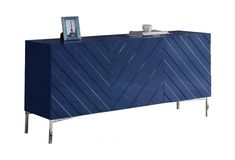 a blue sideboard with a clock on top