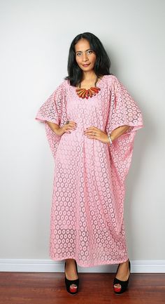 "A stunning bohemian lace caftan dress with a subtle v shaped neck and backbone The dress is handmade from a quality polyester lace fabric and has a gorgeous flow. The big wide sleeves and trendy design gives a romantic feel to this dress, which has very tidy sewing and is made with the highest care. The measurements given below are based upon the inner lining. This gorgeous boho soft dusty pink lace dress is ideal for a family gathering, going to the beach, a garden party, a nice evening out on Bohemian V-neck Maxi Dress With Lace Patchwork, Pink Bohemian Dress With Lace Patchwork, Bohemian Pink Lace Dress, Bohemian V-neck Crochet Dress For Festival, Pink Bohemian Dress With Lace Trim, Lace Festival Dress, Bohemian Crochet Dress With V-neck, Bohemian Maxi Dress With Lace Patchwork For Parties, Bohemian V-neck Crochet Dress As Beach Cover-up