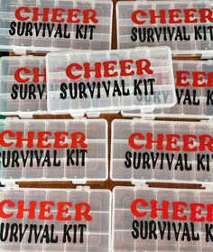 several clear plastic boxes filled with different types of survival kits and labels that read,'cheer survival kit '