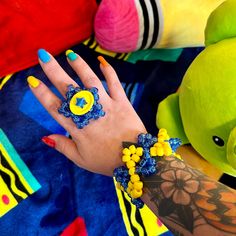 Clown Kandi cuff and star ring set blue and yellow clowncore bracelet accessories Blue and yellow star kandi cuff bracelet and ring set  oversized clowncore jewelry fashion accessories  Tags; clown bracelet clowncore jewelry accessories Kandi kidcore weirdcore decora Rave whimsical celestial jewelry kitschy kitsch Clowncore Jewelry, Clown Bracelet, Clown Kandi, Kandi Kidcore, Whimsical Celestial, Bracelet And Ring Set, Bracelets Kandi, Kandi Cuff, Bracelet And Ring