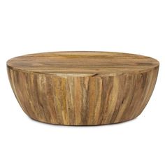 a large wooden bowl sitting on top of a table