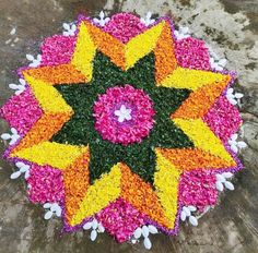 a colorful flower arrangement on the ground