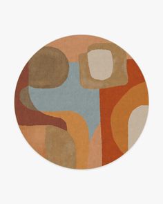 a round rug with an abstract design in orange, brown and blue colors on it