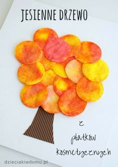 a paper tree made out of cut up circles with text overlay that says fall tree craft using cotton pads