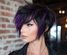 Bold Long Pixie Haircuts in Jet Black and Purple Accents • 333+ Inspiring Lifestyle Ideas Purple And Black Short Hair, Hair Color With Purple Highlights, Pixie Purple Hair, Purple Pixie Cut, Pixie Cut With Highlights, Purple Streaks, Inspiring Lifestyle, Purple Pixie