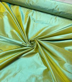 Silk taffeta is very luxurious silk, suitable for the women dress, gowns, evening dress, brides mates dress, mother of the bride dress and much more Silk taffeta could also be used for home decor, best for drapes, pillow covers, bed set etc & much more.... Best for structure dresses & gowns, the fabric has nice hand and weight which is best fit for the any kind of gown.  54" wide 100% silk Iridescent apple green gold color Fabric sold by the yard Thank you for your coming! Please read policy bef Brides Mate Dress, Brides Mate, Covers Bed, Beautiful Home Gardens, Taffeta Fabric, Structured Dress, Silk Taffeta, Bed Set, Color Fabric