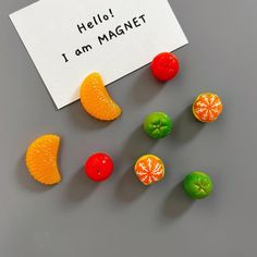 there are some candies on the table with a note that says hello i am magnet