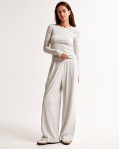 Comfy lounge sweatpants in a soft brushed jersey-modal fabric and wide-leg silhouette, with an elasticated waistband and pockets. Womens Matching Sets, Comfy Sweatpants, Funnel Neck Sweater, Cozy Lounge, Women's Bottoms, Women Essentials, Wide Leg Pant, Lounge Set, New Arrival Dress