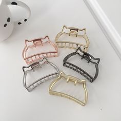 Cute Cat shape Hair Claw Clip -Size:  4*6.3 cm -Weight:  20 g -Package: 1pc -Color: Gold, Matte Gold, Silver, Matte Silver, Rose Gold, Black -Materials:  alloy Welcome to RISEBoutiqueSupplies! I have all kinds of unique hairpins, you will always find your favorite style in my shop! They come in a variety of styles and always fit your style. If you like my products, please favorite my shop. If you have any questions, please feel free to contact me. Please enjoying your shopping in RISEBoutiqueSup Hair Clamp, Half Bun, Bun Updo, Hair Clamps, Hair Claw Clips, Kawaii Jewelry, Hot Gifts, Claw Hair Clips, Hair Claw Clip