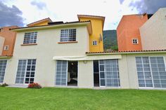 a large house with many windows and doors