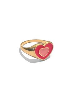 A gold finished ring with a bright pink 70s heart in the middle. The ring is around a size 7, but we encourage you to wear this as a ring for any finger- it looks great as a midi ring too! Pairs beautifully with our Groovy Nailz 100% Zinc Alloy. Keep away from moisture to prevent fading. Ring With Gold Band, Pink Heart Ring, Pink 70s, Pink Heart Rings, Future Jewelry, Eras Tour Outfit, Dream Aesthetic, Midi Ring, Midi Rings